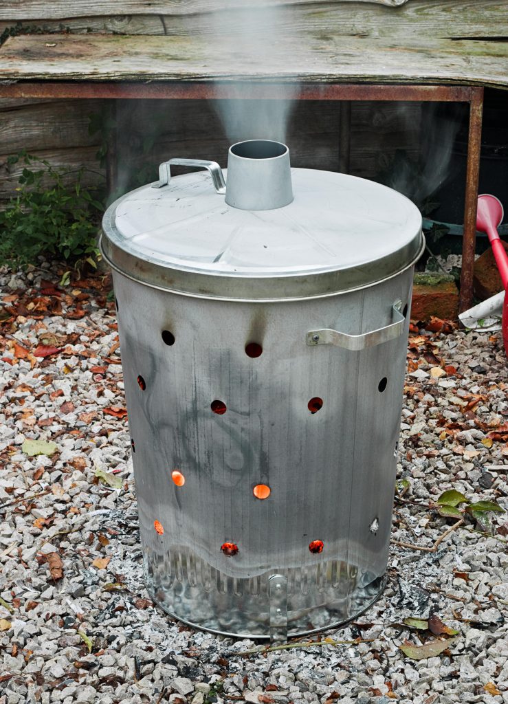 Galvanised steel garden incinerator.