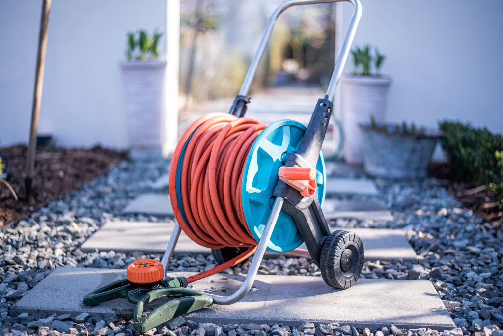 Cart based garden hose reel.