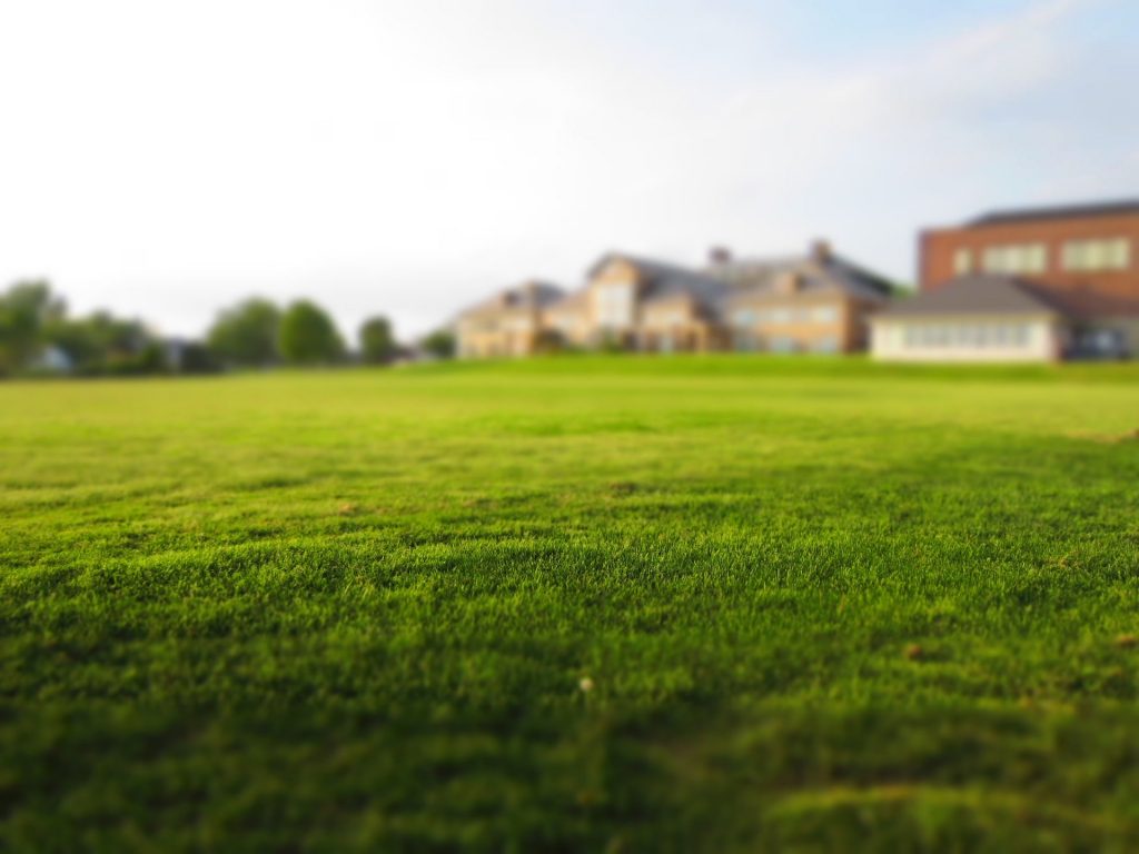 British house with a large lawn.