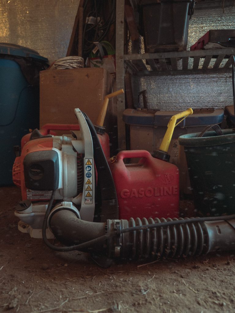 Leaf blower in a garage.